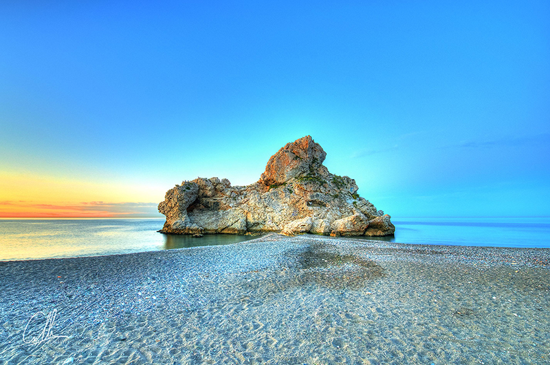 Pôr do sol na Playa Peñón del Cuervo em Málaga